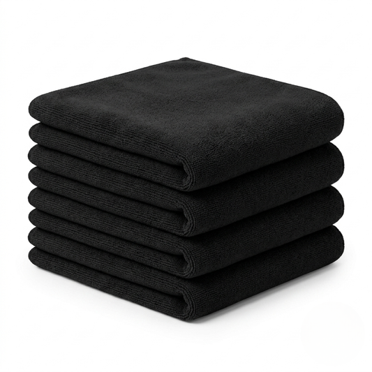 Stack of four folded black SPINX microfiber cloths — 4-pack refill for carbon-fiber pickleball paddle care